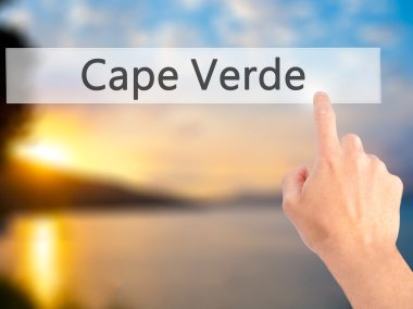 Cape Verde - arka plan bulanık concep üzerinde bir düğmeye basarak el