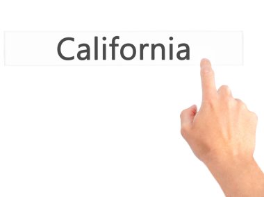 California - arka plan bulanık concep üzerinde bir düğmeye basarak el