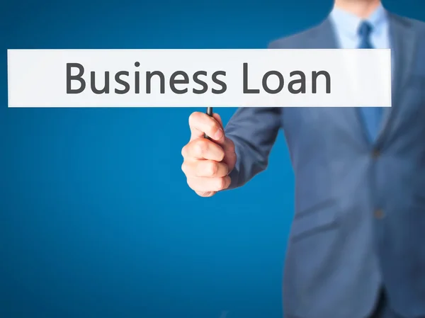 Pożyczka dla przedsiębiorców-człowiek biznesu Wyświetlono znak — Zdjęcie stockowe