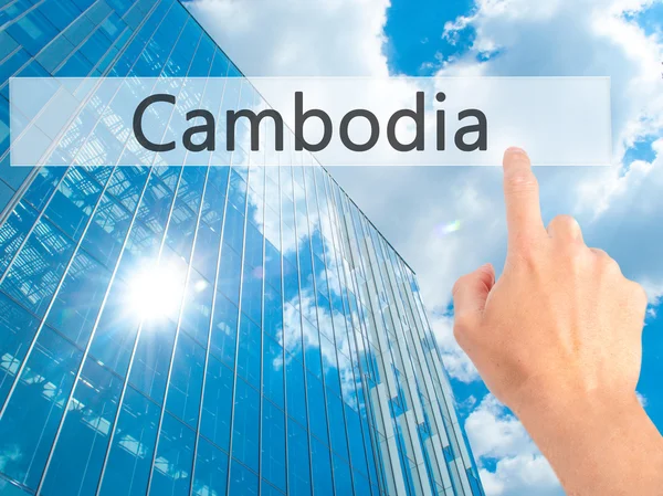Camboja - Mão pressionando um botão no conceito de fundo borrado — Fotografia de Stock