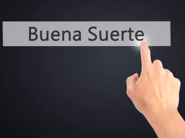 Buena Suerte (Boa Sorte em Espanhol) - Mão pressionando um botão em — Fotografia de Stock