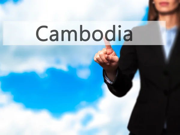 Cambogia - Imprenditrice che preme il pulsante high tech moderno su un — Foto Stock