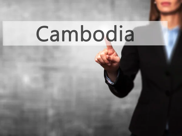 Cambodja - zakenvrouw dringende high-tech moderne knop op een — Stockfoto