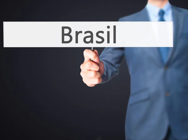Brasil - Empresário mão segurando sinal — Fotografia de Stock