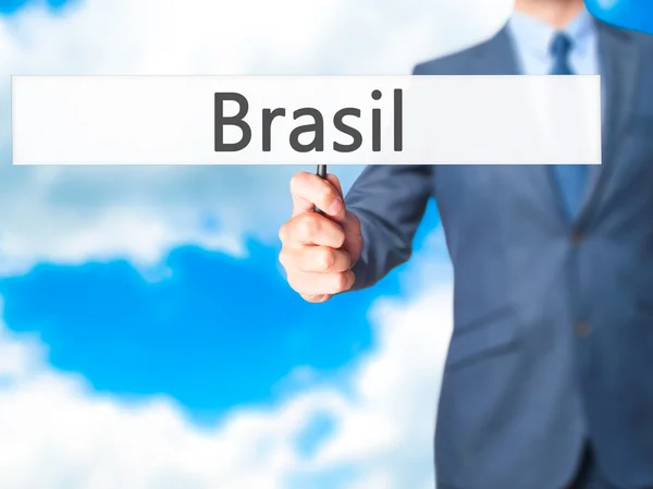 Brasilien - Geschäftsmann hält Schild in der Hand — Stockfoto