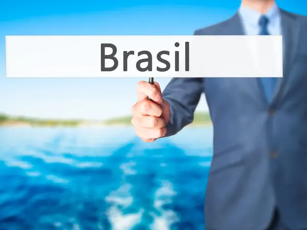 Brasilien - Geschäftsmann hält Schild in der Hand — Stockfoto