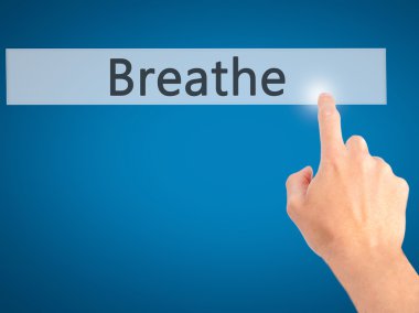 -Arka plan bulanık kavramı o üzerinde bir düğmeye basarak el nefes al