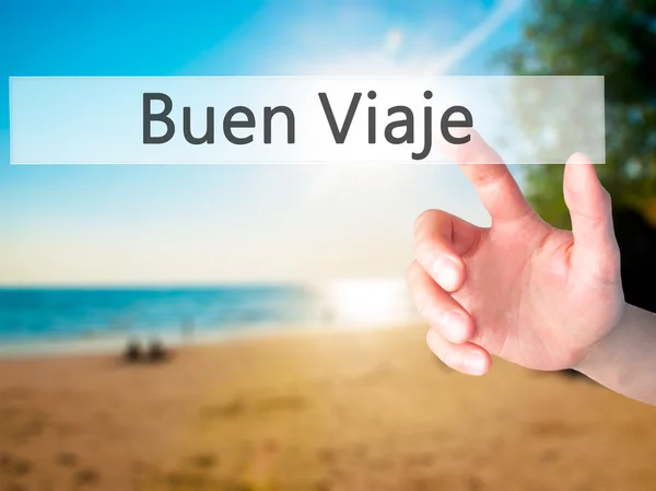 Buen viaje (gute Fahrt auf Spanisch) - Hand drückt eine Taste auf bl — Stockfoto