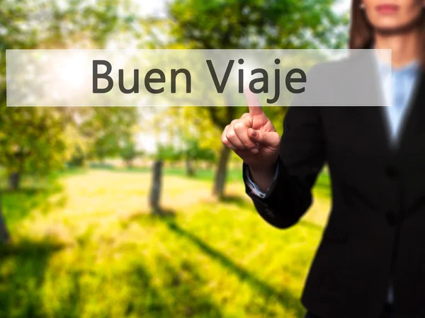 Buen Viaje (Good Trip in Spanish) - Businesswoman pressing moder — Stock Photo, Image