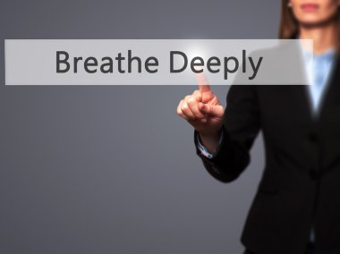 Breathe Deeply - Businesswoman pressing modern  buttons on a vir clipart