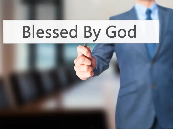 Blessed By God - Businessman hand holding sign — Stock Photo, Image