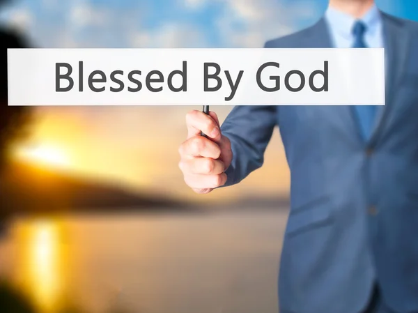 Von Gott gesegnet - Geschäftsmann hält Schild in der Hand — Stockfoto