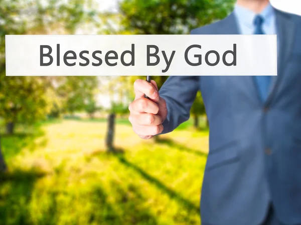 Von Gott gesegnet - Geschäftsmann hält Schild in der Hand — Stockfoto