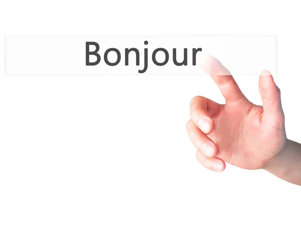 Bonjour (Good Morning in French) - Hand pressing a button on blu — Stock Photo, Image