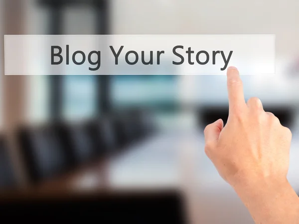 Blog Your Story - Hand pressing a button on blurred background c — Stock Photo, Image