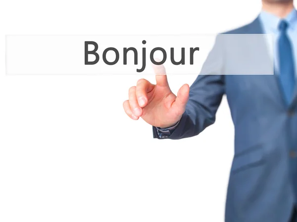Bonjour (Good Morning in French) - Businessman hand touch  butto — Stock Photo, Image