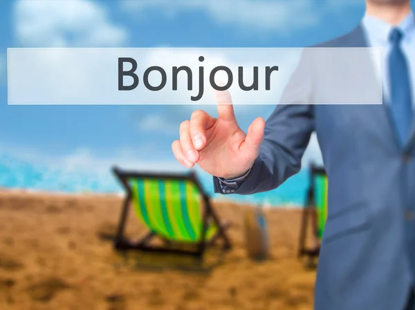 Bonjour (Good Morning in French) - Businessman hand touch  butto — Stock Photo, Image