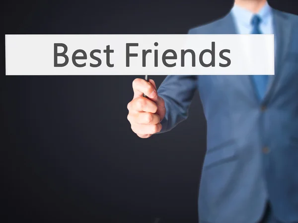 Best Friends - Businessman hand holding sign — Stock Photo, Image