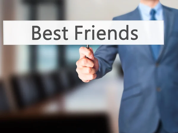 Best Friends - Businessman hand holding sign — Stock Photo, Image