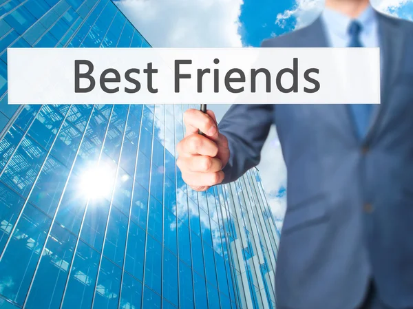 Mejores amigos - Empresario mano sosteniendo cartel —  Fotos de Stock