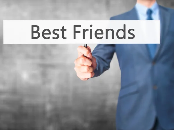 Best Friends - Businessman hand holding sign — Stock Photo, Image