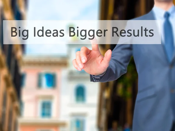 Big Ideas Bigger Results - Businessman pressing virtual button — Stock Photo, Image