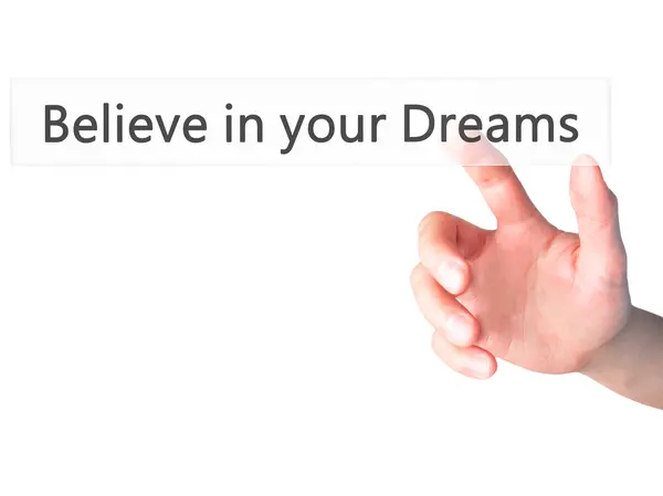 Cree en tus sueños - Mano presionando un botón en el respaldo borroso — Foto de Stock