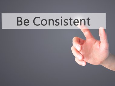 Olmak tutarlı - arka plan bulanık con üzerinde bir düğmeye basarak el