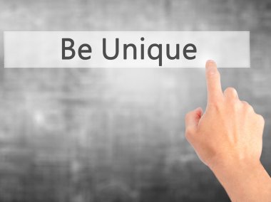 Unique - arka plan bulanık kavramı üzerinde bir düğmeye basarak el olması