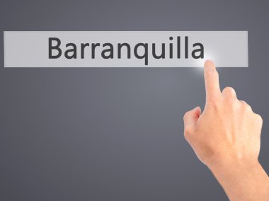 Barranquilla - arka plan bulanık konsantrasyon üzerinde bir düğmeye basarak el