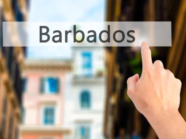 Barbados - arka plan bulanık kavramı üzerinde bir düğmeye basarak el 