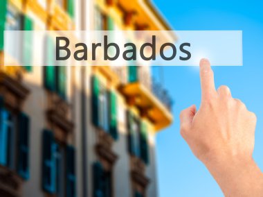 Barbados - arka plan bulanık kavramı üzerinde bir düğmeye basarak el 