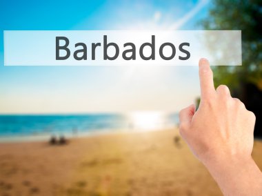 Barbados - arka plan bulanık kavramı üzerinde bir düğmeye basarak el 