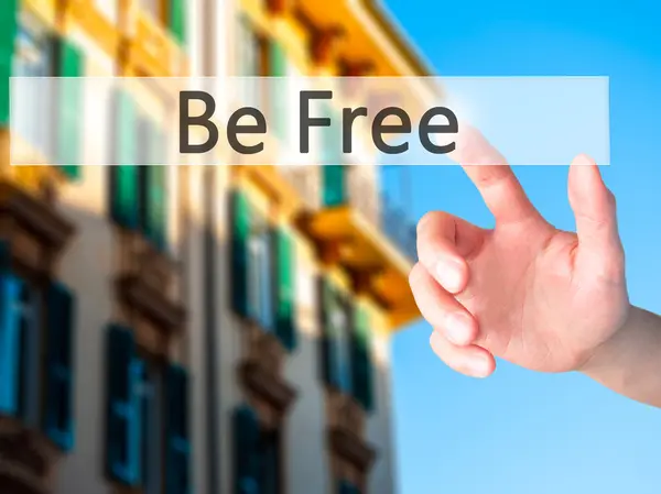 Be Free - Hand pressing a button on blurred background concept o — Stock Photo, Image