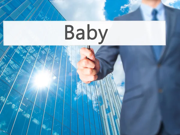 Bayi Manusia bisnis menunjukkan tanda-tanda — Stok Foto
