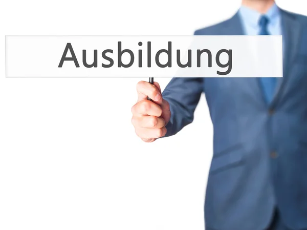 Ausbildung (Education in German) - Business man showing sign — Stock Photo, Image