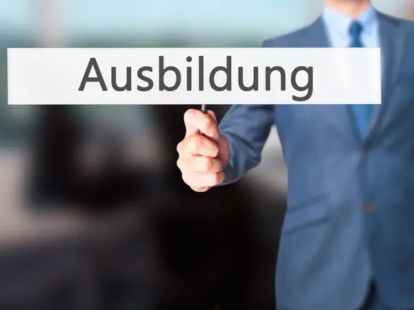 Ausbildung (Educação em alemão) - Homem de negócios mostrando sinal — Fotografia de Stock