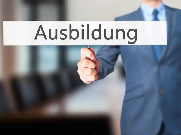 Ausbildung (Éducation en allemand) - Homme d'affaires montrant signe — Photo