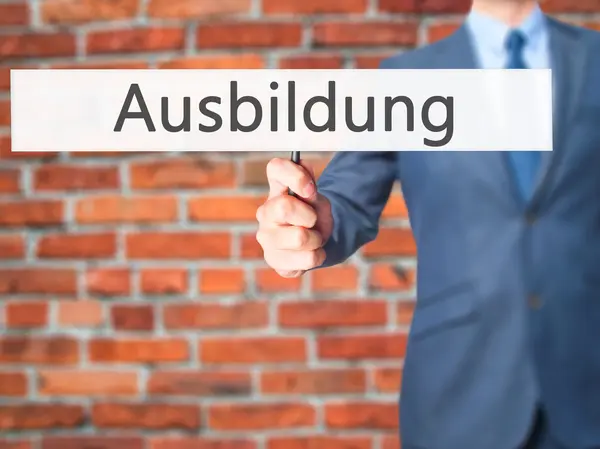 Ausbildung (vzdělání v němčině) - obchodní muž známek — Stock fotografie