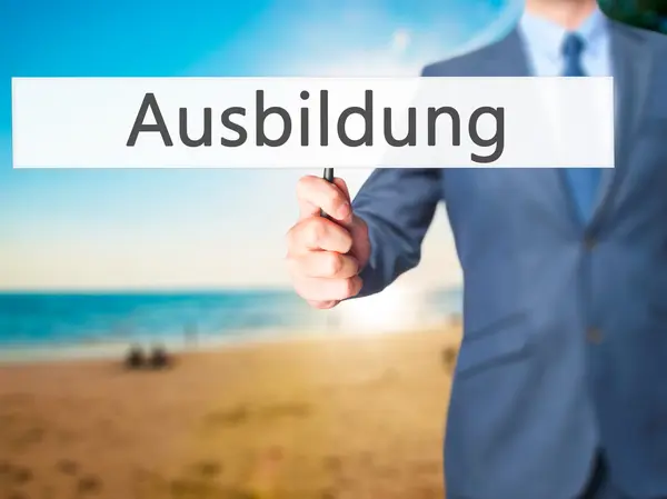 Ausbildung (utbildning på tyska) - affärsman visar tecken — Stockfoto