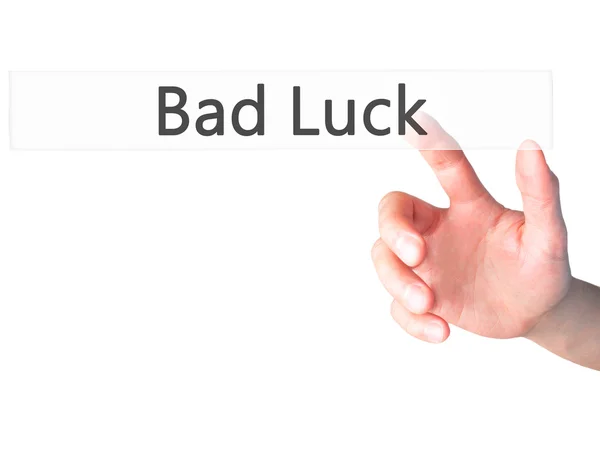 Bad Luck - Mano premendo un pulsante sul concetto di sfondo sfocato — Foto Stock