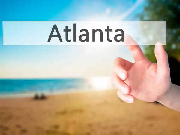 Atlanta - нажатие кнопки на размытом фоне — стоковое фото