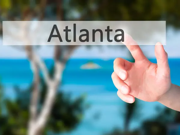 Atlanta - нажатие кнопки на размытом фоне — стоковое фото