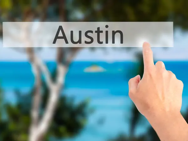 Austin - Mano premendo un pulsante sul concetto di sfondo sfocato su — Foto Stock