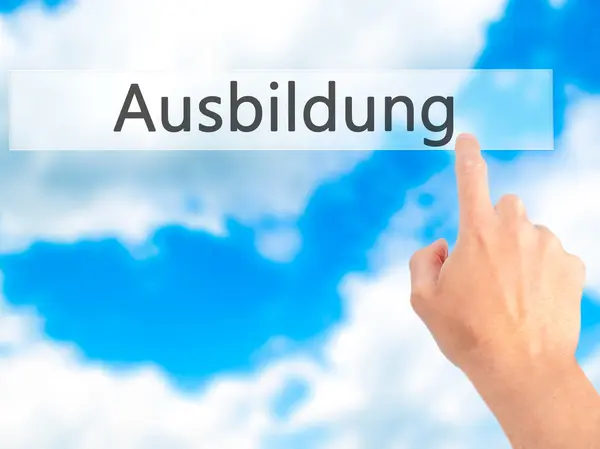 Ausbildung (Education in German) - Hand pressing a button on blu — Stock Photo, Image