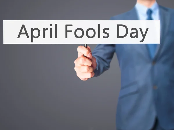 April Fools Day - Business man showing sign — Stock Photo, Image