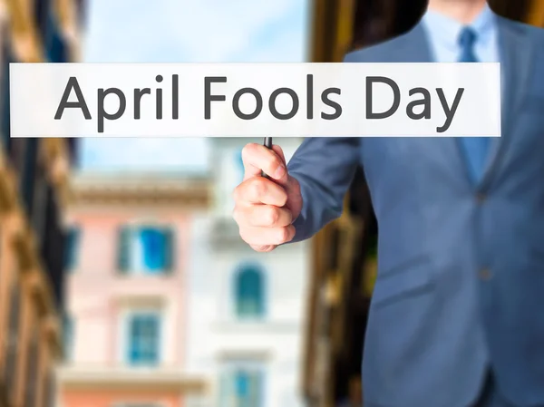 April Fools Day - Business man showing sign — Stock Photo, Image