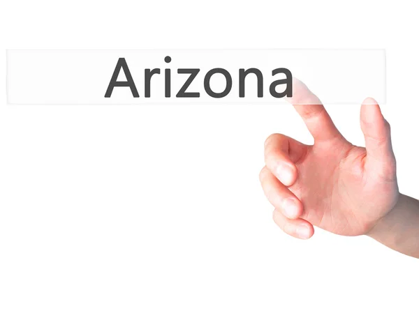 Arizona - Mano premendo un pulsante sul concetto di sfondo sfocato o — Foto Stock