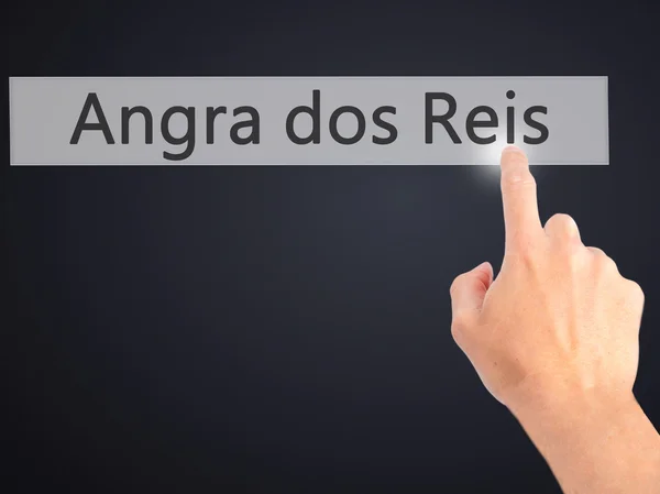 Angra dos Reis - Mano presionando un botón sobre fondo borroso co —  Fotos de Stock