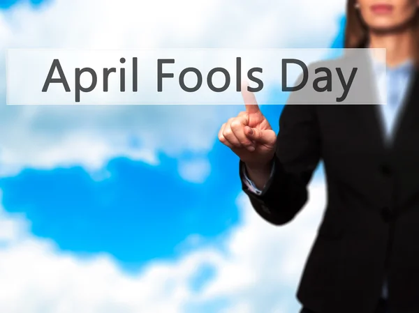 April Fools Day - Isolated female hand touching or pointing to b — Stock Photo, Image